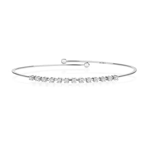 DIAMOND CLAW SET FLEXI BANGLE IN 18CT WHITE GOLD