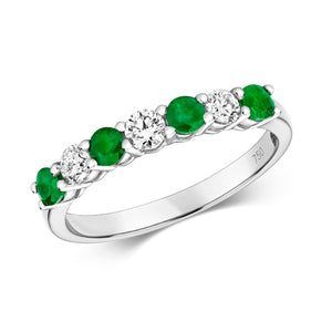 DIAMOND & EMERALD CLAW SET ETERNITY RING IN 18CT WHITE GOLD